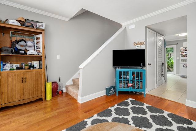 507 Stinson Dr Unit B3, Charleston, SC 29407 - living area with stairway, wood finished floors, crown molding, and baseboards