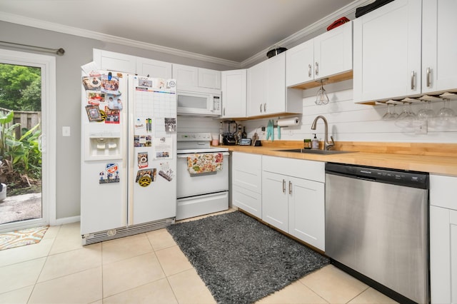 507 Stinson Dr Unit B3, Charleston, SC 29407 - kitchen featuring white appliances, a sink, white cabinetry, crown molding, and light tile patterned floors