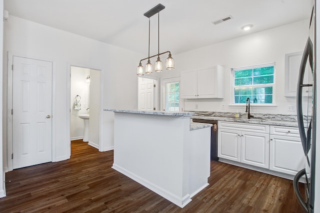 4818 Buttercup Way, Summerville, SC 29485 - kitchen featuring a sink, dark wood-type flooring, white cabinetry, and light stone countertops