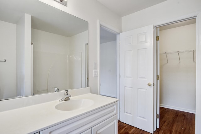 4818 Buttercup Way, Summerville, SC 29485 - bathroom with vanity, wood finished floors, a spacious closet, and a shower