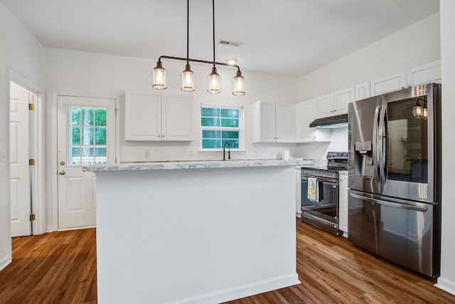 4818 Buttercup Way, Summerville, SC 29485 - kitchen featuring stainless steel appliances, under cabinet range hood, white cabinets, dark wood-style flooring, and a center island