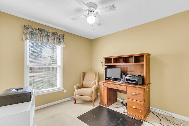 office featuring light colored carpet and ceiling fan