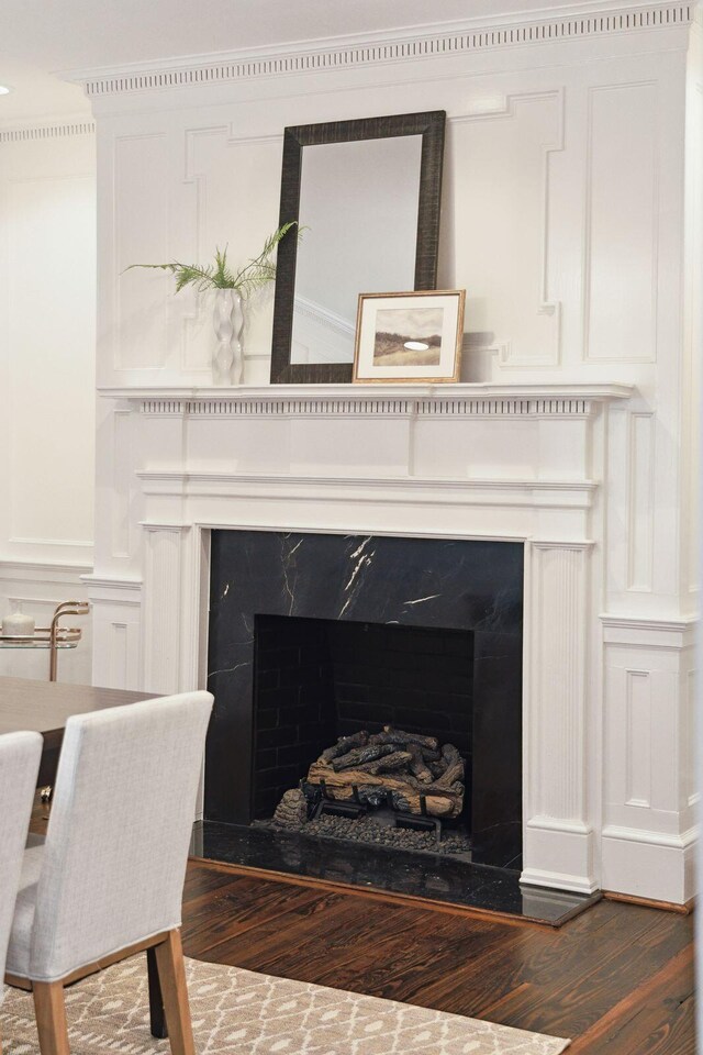 2 Bedons Aly, Charleston, SC 29401 - detailed view of a premium fireplace, wood finished floors, and a decorative wall