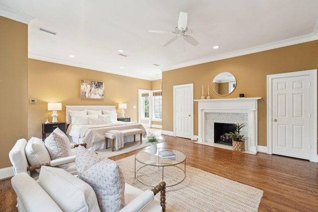 2 Bedons Aly, Charleston, SC 29401 - bedroom with wood finished floors, crown molding, recessed lighting, and a high end fireplace