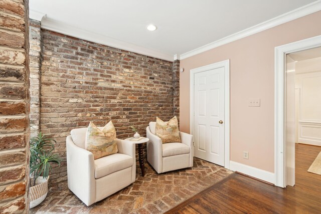 2 Bedons Aly, Charleston, SC 29401 - sitting room with brick wall, crown molding, wood finished floors, and recessed lighting