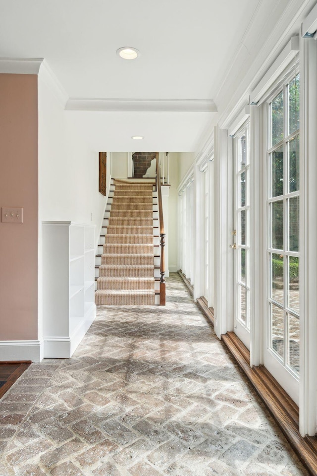 2 Bedons Aly, Charleston, SC 29401 - stairs featuring brick flooring, crown molding, and recessed lighting