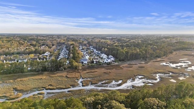 drone / aerial view featuring a view of trees