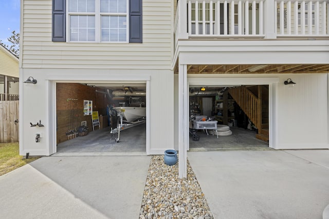 garage with concrete driveway