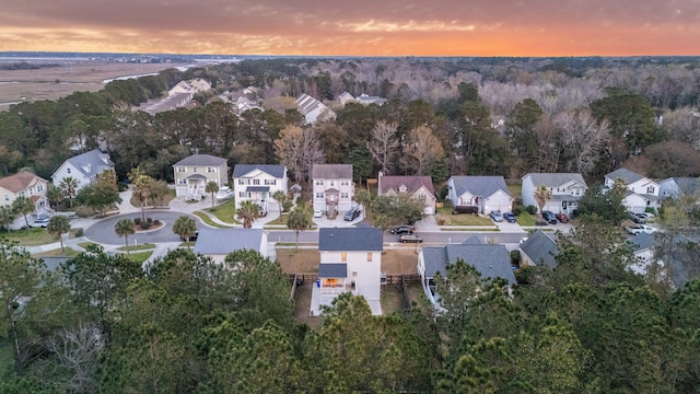 aerial view at dusk with a residential view