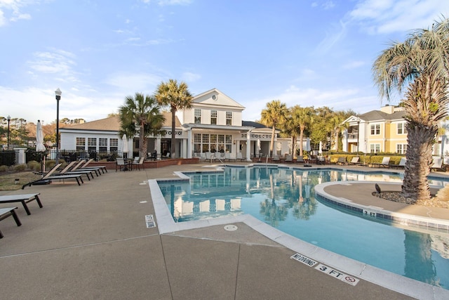 pool with a patio