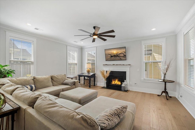113 Grimball St, Summerville, SC 29486 - living room featuring ornamental molding, a fireplace with flush hearth, a ceiling fan, healthy amount of natural light, and recessed lighting