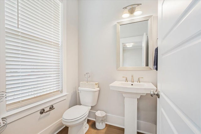 113 Grimball St, Summerville, SC 29486 - bathroom featuring toilet, wood finished floors, baseboards, and a sink
