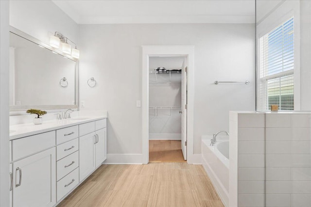 113 Grimball St, Summerville, SC 29486 - full bath with double vanity, a garden tub, a walk in closet, and baseboards