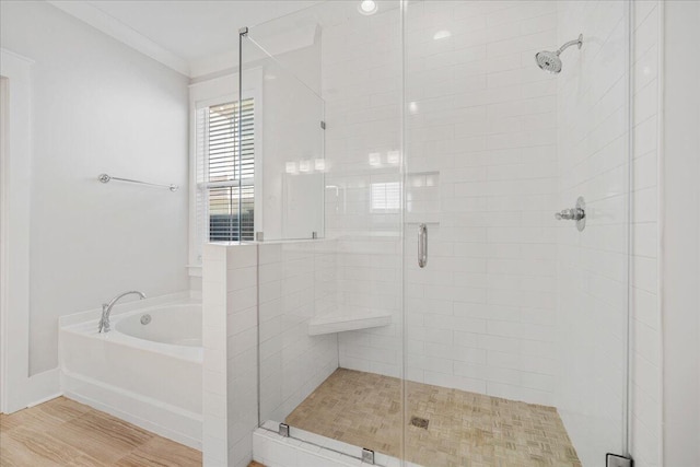113 Grimball St, Summerville, SC 29486 - bathroom featuring a bath, a stall shower, and wood finished floors
