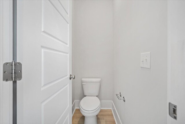 113 Grimball St, Summerville, SC 29486 - bathroom featuring baseboards, toilet, and wood finished floors