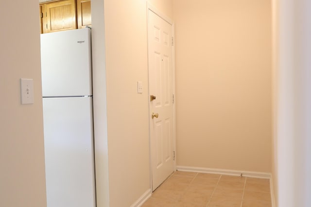 403 Sunny Side Way, Summerville, SC 29485 - kitchen featuring freestanding refrigerator, baseboards, and light tile patterned flooring