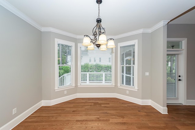 287 Commonwealth Rd, Mount Pleasant, SC 29466 - unfurnished dining area featuring baseboards, an inviting chandelier, and wood finished floors