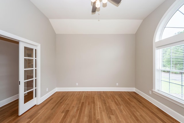 287 Commonwealth Rd, Mount Pleasant, SC 29466 - unfurnished room featuring baseboards, a ceiling fan, light wood-style flooring, and vaulted ceiling
