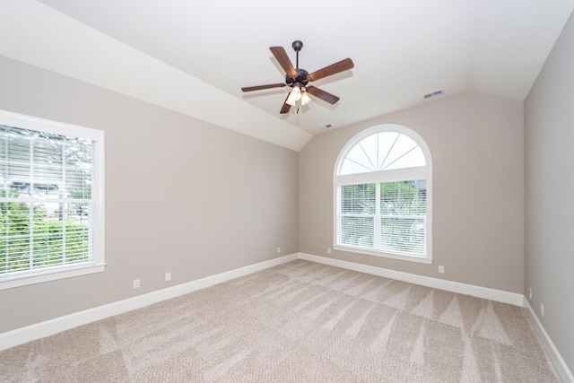 287 Commonwealth Rd, Mount Pleasant, SC 29466 - empty room featuring a ceiling fan, light colored carpet, visible vents, and vaulted ceiling