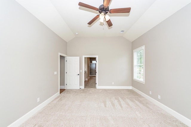 287 Commonwealth Rd, Mount Pleasant, SC 29466 - unfurnished bedroom featuring visible vents, baseboards, lofted ceiling, and light carpet