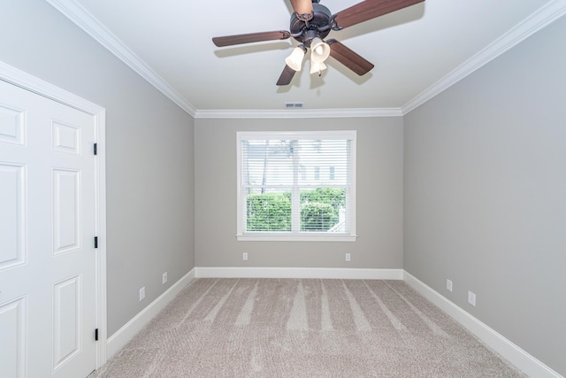 287 Commonwealth Rd, Mount Pleasant, SC 29466 - empty room with crown molding, light colored carpet, a ceiling fan, and visible vents