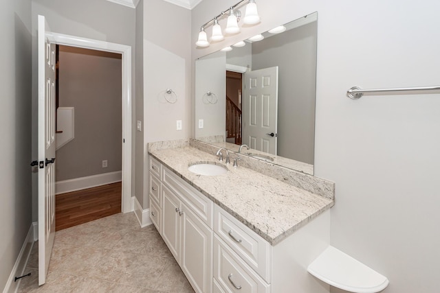287 Commonwealth Rd, Mount Pleasant, SC 29466 - bathroom featuring vanity, baseboards, ornamental molding, and tile patterned flooring