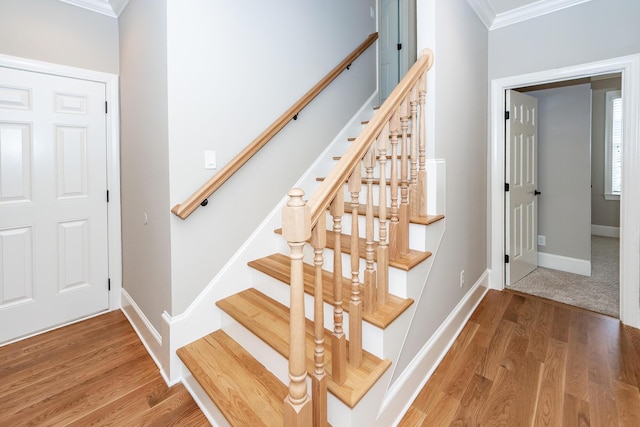 287 Commonwealth Rd, Mount Pleasant, SC 29466 - stairway with crown molding, baseboards, and wood finished floors