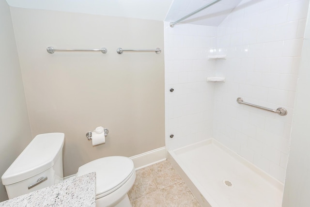 287 Commonwealth Rd, Mount Pleasant, SC 29466 - full bath with tile patterned flooring, baseboards, toilet, and tiled shower