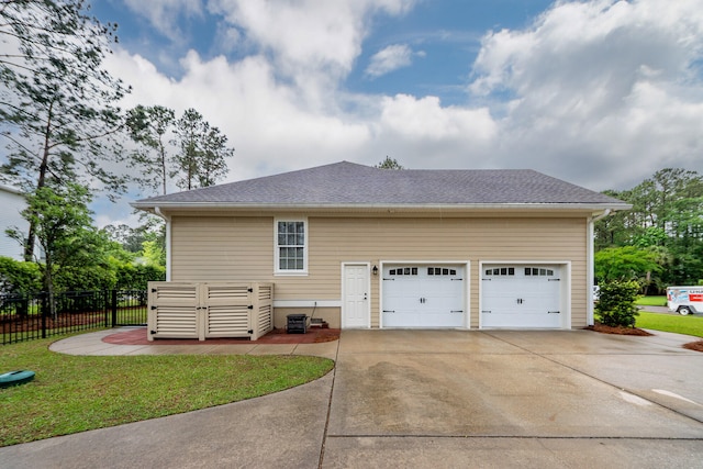 287 Commonwealth Rd, Mount Pleasant, SC 29466 - view of side of home featuring fence, roof with shingles, a garage, concrete driveway, and a yard