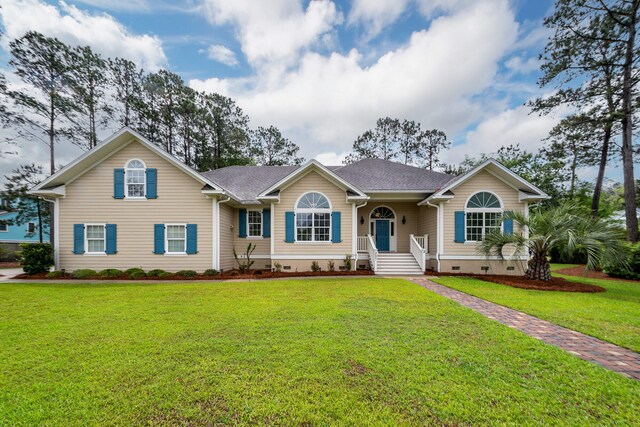 287 Commonwealth Rd, Mount Pleasant, SC 29466 - view of front facade with roof with shingles, a front yard, and crawl space