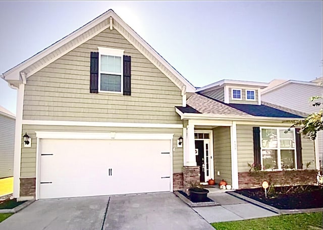 view of front of property featuring a garage