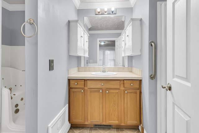 bathroom with vanity and crown molding