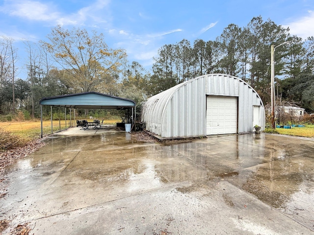 garage with a carport