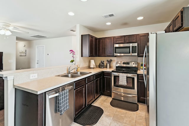 161 Brittondale Rd, Summerville, SC 29485 - kitchen with ceiling fan, a peninsula, visible vents, appliances with stainless steel finishes, and a sink