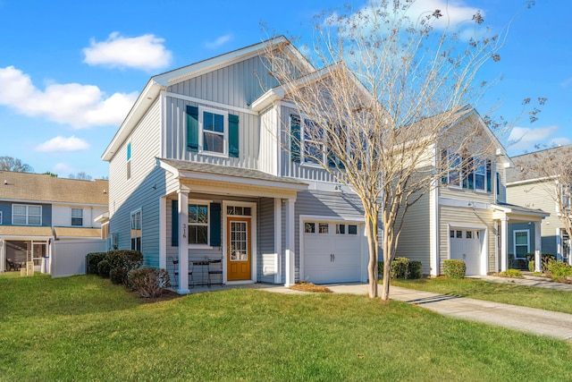 view of front of property featuring a garage, a front lawn, and covered porch