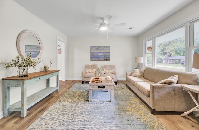 1515 Mulberry St, Charleston, SC 29407 - living area with wood finished floors, a ceiling fan, and baseboards