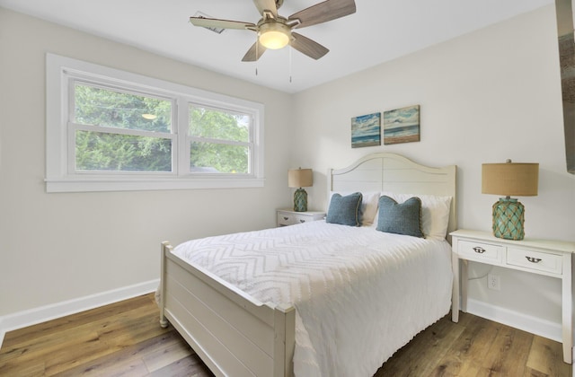 1515 Mulberry St, Charleston, SC 29407 - bedroom featuring baseboards, wood finished floors, and ceiling fan