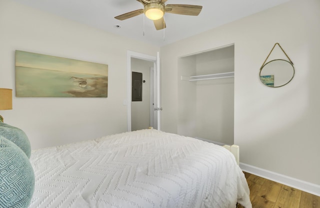 1515 Mulberry St, Charleston, SC 29407 - bedroom featuring electric panel, wood finished floors, baseboards, a closet, and ceiling fan