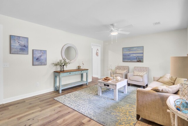 1515 Mulberry St, Charleston, SC 29407 - living area with wood finished floors, a ceiling fan, and baseboards