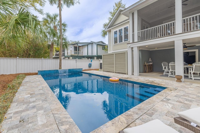 view of pool featuring a fenced in pool, a patio area, and fence