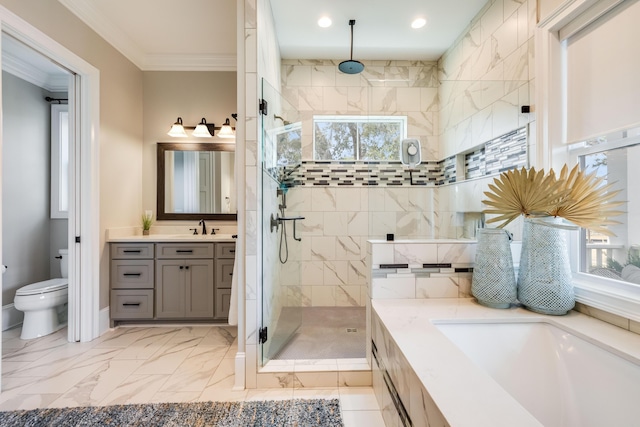 bathroom featuring vanity, crown molding, a stall shower, and marble finish floor