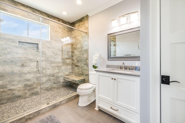 bathroom with tile patterned floors, toilet, recessed lighting, a shower stall, and vanity