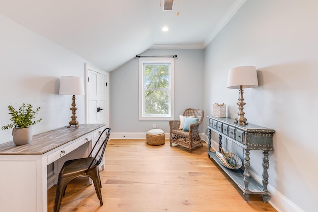 living area featuring baseboards, visible vents, lofted ceiling, light wood-style flooring, and ornamental molding