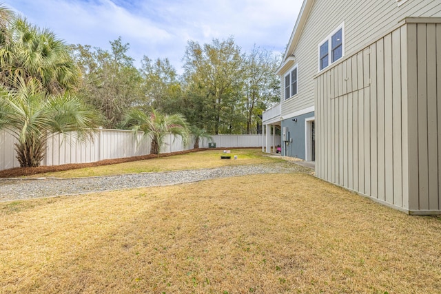 view of yard with a fenced backyard