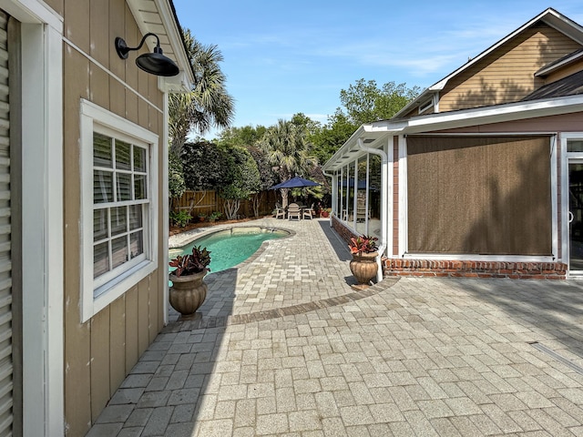 view of patio / terrace with a fenced in pool and a fenced backyard