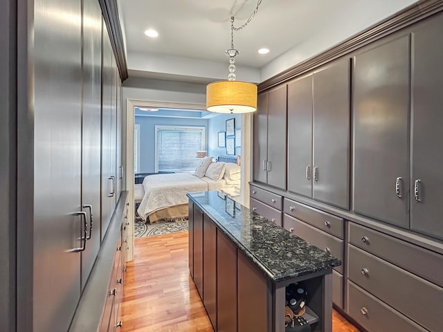 bedroom with recessed lighting and light wood-type flooring