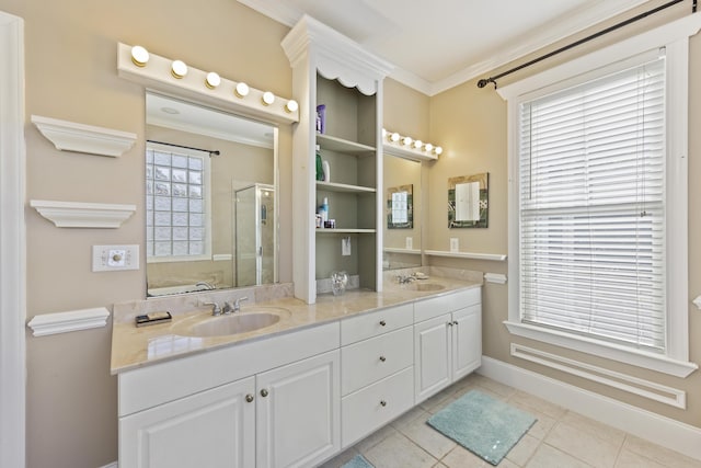 bathroom featuring tile patterned floors, vanity, walk in shower, and crown molding