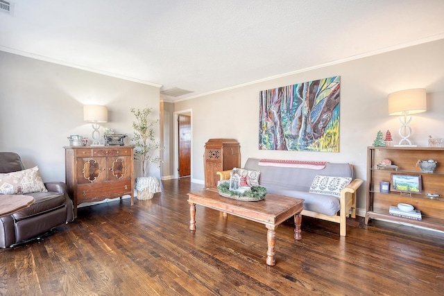 living room featuring dark hardwood / wood-style flooring and ornamental molding