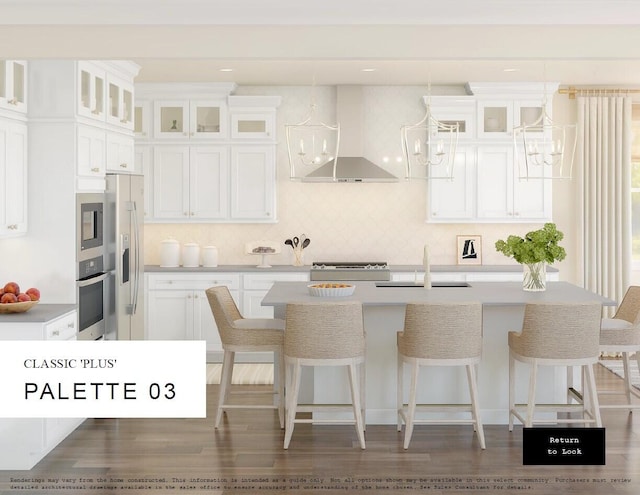 kitchen with a center island with sink, stainless steel appliances, extractor fan, and white cabinetry