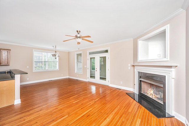 2301 N Creek Dr, Mount Pleasant, SC 29466 - unfurnished living room with a fireplace, light wood-type flooring, ornamental molding, and baseboards